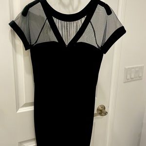 Black dress with sheer neckline